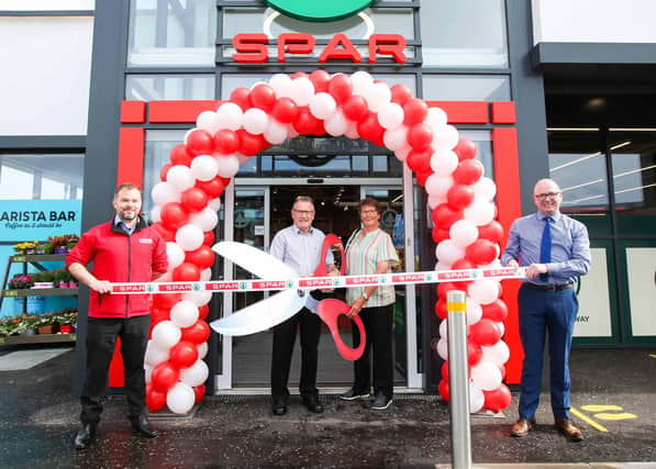 The store was officially opened by local resident and recently retired former SPAR store manager, Bertie Tyrrell  (centre) who worked for Henderson Retail for over 20 years in a variety of store and support team roles. He was joined by his wife Kate who also worked for the company.
Also pictured is store manager Andrew McIleese (left) and area manager, Ian Mullin (right).