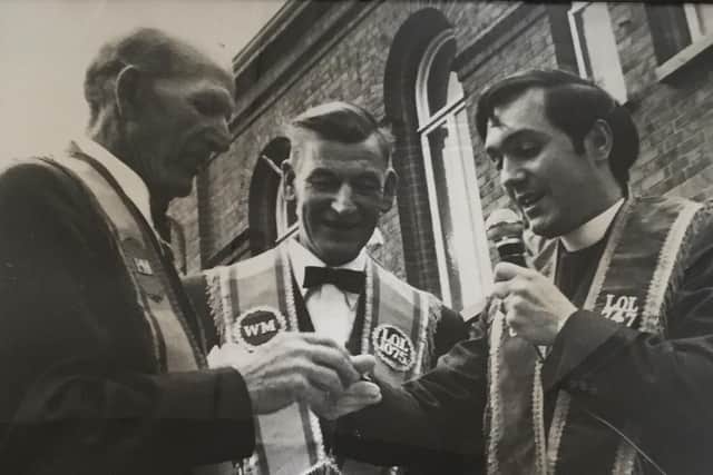 Left to right are Wor Bro Jimmy Black LOL 1075, Wor Bro Billy Hull, WM LOL 1075 and Wor Bro Reverend Desmond Hanna LOL 747, Rector of St Christophers Parish Church, Mersey Street. The date is July 12th, 1973 and the photograph shows Bro Black being presented with a long service medal before his lodge Pride of Ballymacarrett Temperance LOL 1075 set off from Dee Street to join with Ballymacarrett District LOL 6. Picture courtesy of William Craig