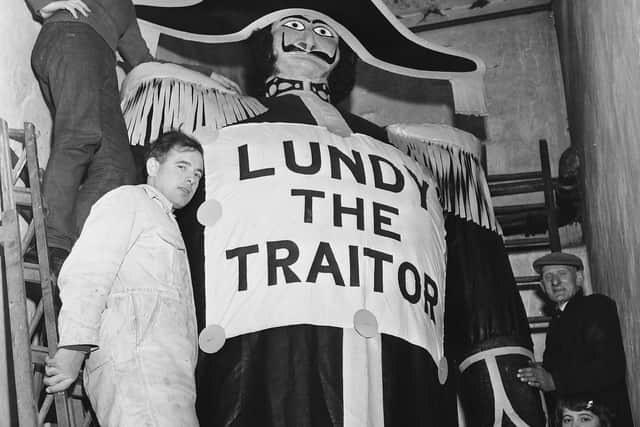TRAITOR... The finishing touches are added to an effigy of 'Lundy the Traitor' ahead of the Apprentice Boys' annual 'Shutting of the Gates' demonstration. Taken in 1960s.