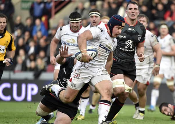 Ulster's Luke Marshall runs to score a try during the European Rugby Union Champions Cup match withToulouse on December 20, 2015 at the Ernest Wallon Stadium in Toulouse.