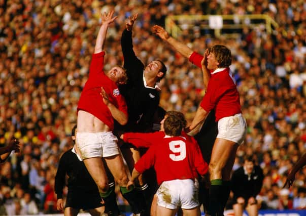 New Zealand's Andy Haden (middle) is flanked by Maurice Colclough (left) and Steve Bainbridge (right) of the British Lions as he competes for a restart during the fourth test match between New Zealand and the British Lions at Eden Park on July 16, 1983 in Auckland. Pic by Getty.