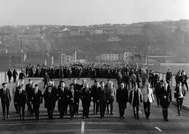 Civil rights march on its way across the Craigavon Bridge, Londonderry, in November 1968, a month after the banned march of October 5 which ended in violence. Dr Kingsley writes: "This is not just a case of introducing more teaching about the civil rights movement in controlled schools. Given the unreliability in the historical treatment of this subject, I would be concerned about the material being taught"