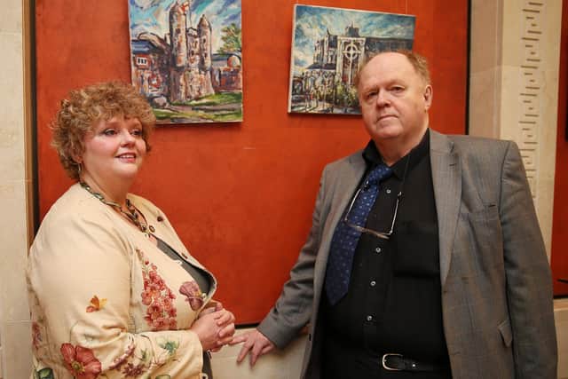 Derek Quinton in 2015 with his sister Aileen at an exhibition of their late brother Ian's artwork at Stormont