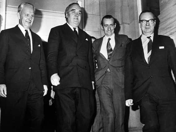 Pictured in November 1973 are, from right, Brian Faulkner, leader of the Unionist Party, Willie Whitelaw, Secretary of State for Northern Ireland, Mr Oliver Napier of the Alliance Party and Mr Gerard Fitt, Social Democratic Party, leaving Stormont Castle. Picture: PA Wire