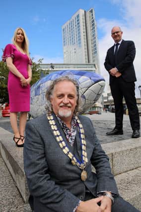 Samantha Kirk, VP of Dynamic Signal is pictured with Darragh McCarthy, Founder and CEO of FinTrU alongside Michael Stewart, President of Belfast Chamber