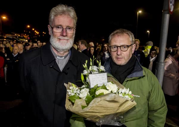 Rev David Clements (left), whose father was murdered by the IRA, and Alan McBride, whose wife was murdered in the 1993 Shankill bomb, pay tribute to victims of the 1993 loyalist massacre in Greysteel, Co Londonderry on its 25th anniversary. Photo: Liam McBurney/PA