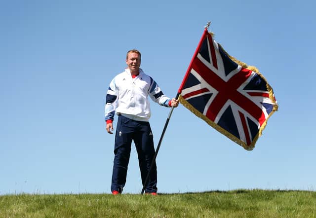 File photo dated 23-07-2012 of Sir Chris Hoy after he was announced as Team GB flagbearer at the opening ceremony of London 2012 at the cycling team's training base in Celtic Manor, Wales.