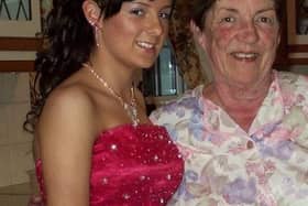 Rachael Finaly wearing the formal dress, with her late grandmother Carrie Finlay