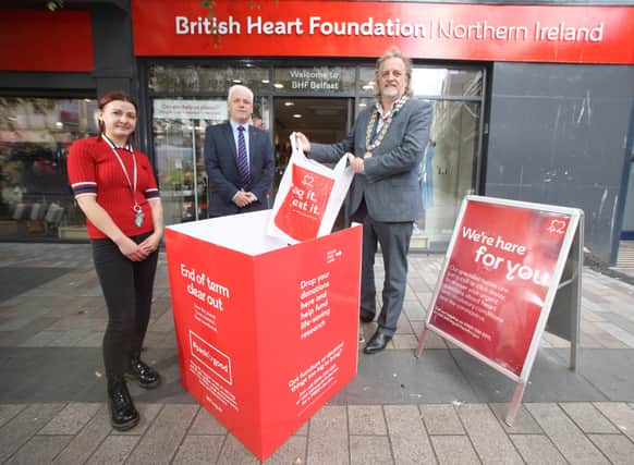 Belfast BHF NI shop manager Jasmin Lawther, BHF NI Head Fearghal McKinney and President of Belfast Chamber Michael Stewart