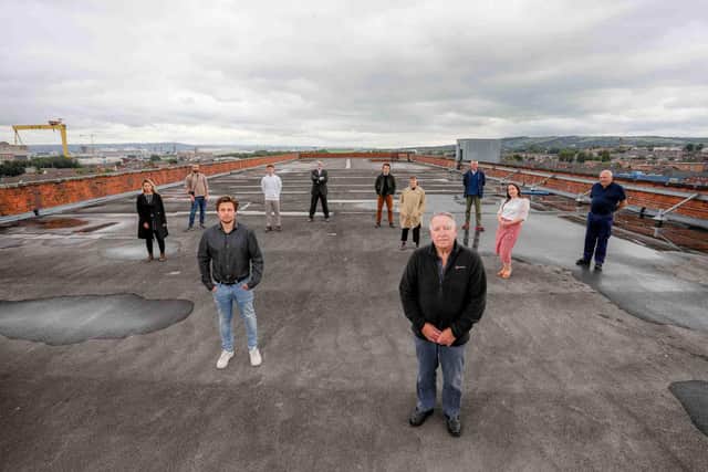 Pictured on the roof of the iconic building are Portview Trade Centre Chairman Brendan Mackin (front right) with Ralf Alwani (front left) from Belfast-based Urban Scale Interventions (USI) and some of the consultants who will be assisting USI on the concept development of the project and ensuring that it is sustainable and self-sufficient