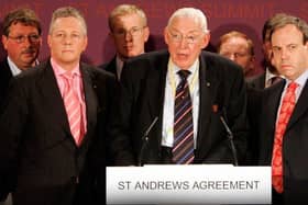 Ian Paisley and senior members of the DUP at St Andrews in Scotland in 2006 after the deal. The party made constraints on ministers one of its centre-piece demands for the restoration of Stormont, yet now, under a different leadership, it is helping to push through legislation that will remove those constraints
