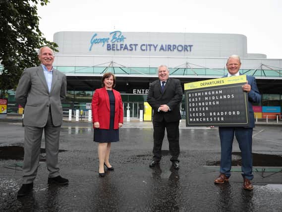 Brian Ambrose (right), Chief Executive at Belfast City Airport has announced six new Aer Lingus routes from Belfast City Airport to Edinburgh, Manchester, Birmingham, East Midlands, Leeds Bradford and Exeter. David Shepherd (second from right), Chief Commercial Officer at Aer Lingus said the move will ensure connectivity between Northern Ireland and the rest of the UK. Andy Jolly (left) , Managing Director of Stobart Air the operator of Aer Lingus Regional routes, confirmed five ATR72-600 aircraft would be based at Belfast City Airport. Economy Minister Diane Dodds (second from left) was at the airport for the announcement.