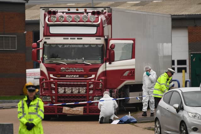 Police and forensic officers at the Waterglade Industrial Park in Grays, Essex, after 39 bodies of Vietnamese migrants were found inside the lorry on the industrial estate.