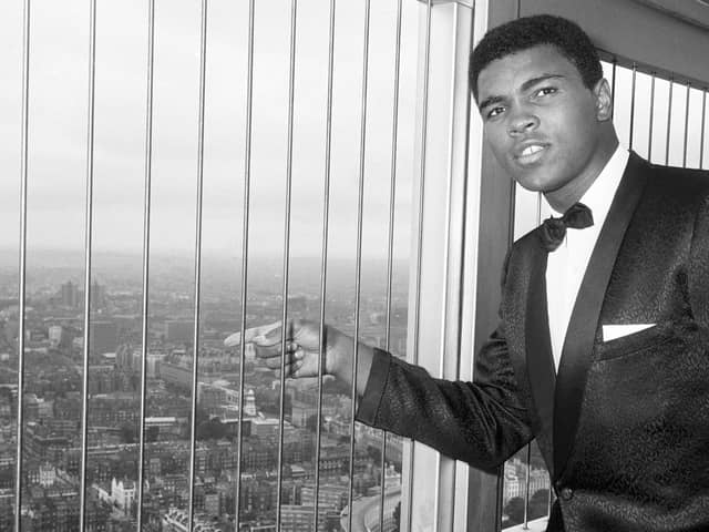 World heavyweight champion Muhammad Ali looking down on the London scene from the 600-foot high GPO Tower in London's Howland Street during 1966. Pic by PA.
