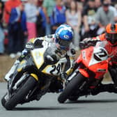 Keith Amor (24) and Ryan Farquhar (77) had a fierce rivalry at the Irish national road races.