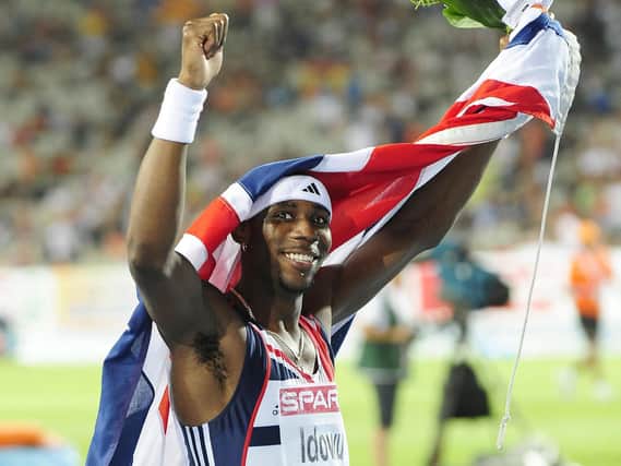 Great Britain's Phillips Idowu celebrates his victory in the Men's Triple Jump Final