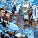 Sergio Aguero lifts the Premier League trophy