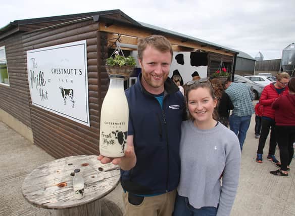 .Portrush Dairy farmers William and Alison Chestnutt pictured at their milk vending machine on their farm. Pic Steven McAuley/McAuly Multimedia