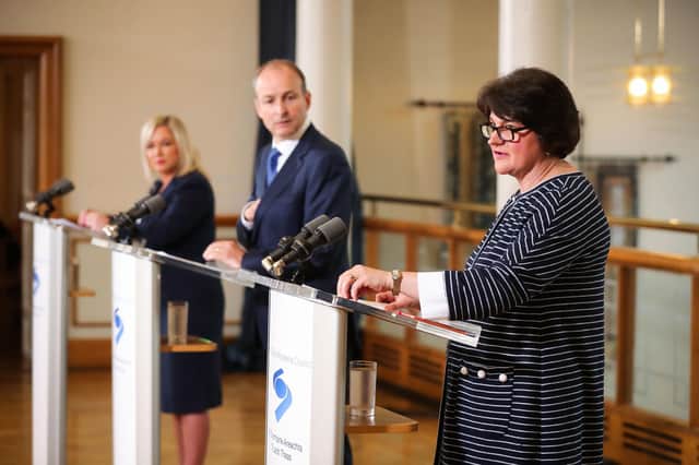 Michelle O’Neill, Taoiseach Micheal Martin and Arlene Foster at a press confrerence at Dublin Castle for the summit of the North South Ministerial Council