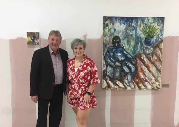 Sammy Wilson MP with artist Robyn Haslett at the recent exhibition in Belfast.