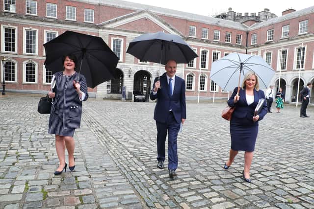 First Minister Arlene Foster, Taoiseach Micheal Martin and deputy First Minister Michelle O'Neill at Dublin Castle for the first summit of the North South Ministerial Council (NSMC) since before Northern Ireland's powersharing administration collapsed.