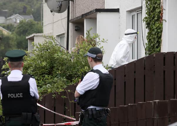 Police at the scene of a woman's death in Newry. 
Photograph by Declan Roughan