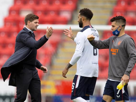 Rangers manager Steven Gerrard (left) shakes hands with Connor Goldson after the Ladbrokes Scottish Premiership match at Pittodrie Stadium