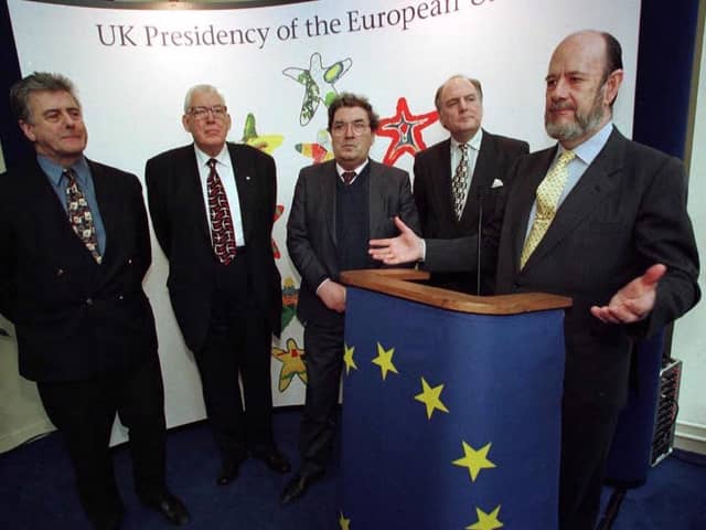 John Hume, centre, in 1998 with fellow MEPs Jim Nicholson, left, and Ian Paisley. The trio worked together to get funds for Northern Ireland, and are seen above at an event to discuss such funding, with Jim Dougal, Head of Representation for EU in NI and the President of the European Parliament, right, Jose  Maria Gil-Robles (AP Photo/Paul McErlane)