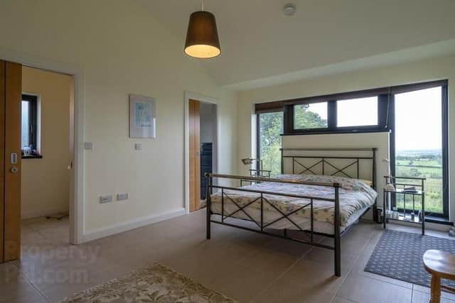 The property has four bedrooms - two with en-suites and walk-in dressing areas