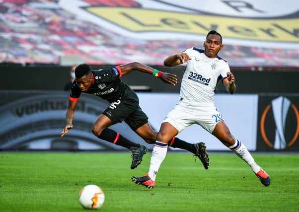 Rangers' Alfredo Morelos (right) and Bayer 04 Leverkusen's Edmond Tapsoba battle for the ball in the UEFA Europa League, quarter-final. Pic by PA.