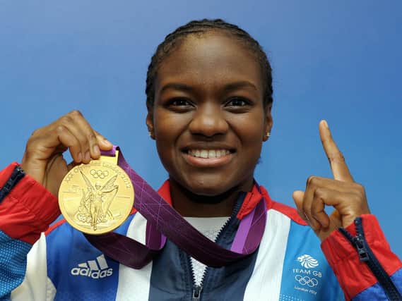 Great Britain's Nicola Adams with her gold medal won in the boxing 51kg category