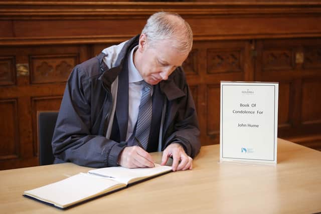 Gregory Campbell MP signing the Book of Condolences for John Hume in the Guildhall, Londonderry.
Picture by Lorcan Doherty / Press Eye