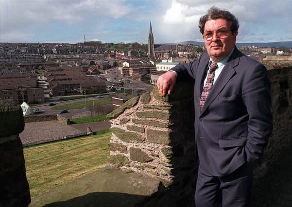John Hume on the walls of Londonderry, overlooking the Bogside. Gregory Campbell writes: "The exodus of unionists from the cityside of Londonderry occurred when peaceful nationalism and violent republicanism was on the rise"