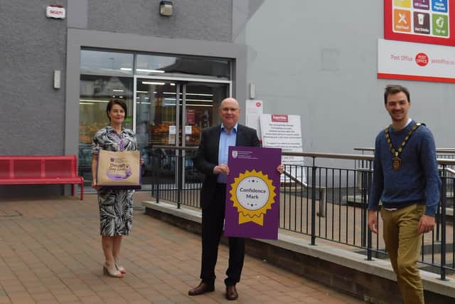Pictured at the launch of the Confidence Mark in Omagh are: Councillor Chris Smyth, Chairman of Fermanagh and Omagh District Council, Mr John Wallace, Manager, Supervalu Omagh representing Omagh Town Centre Forum and Mrs Kim McLaughlin, Director of Regeneration and Planning, Fermanagh and Omagh District Council