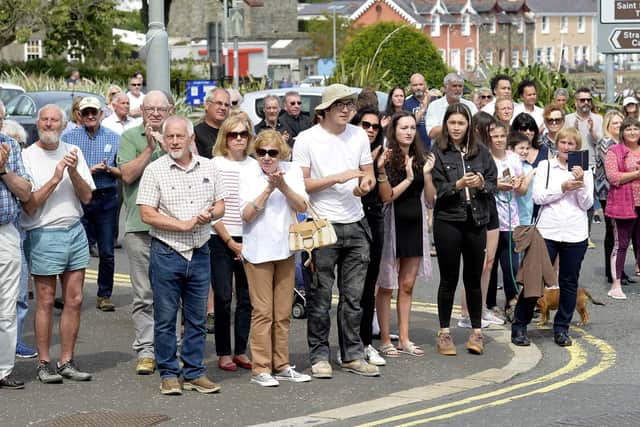 People spill out on to the streets in Strangford to bid a final farewell to Brian Black. (Photo: Stephen Hamilton/Presseye)