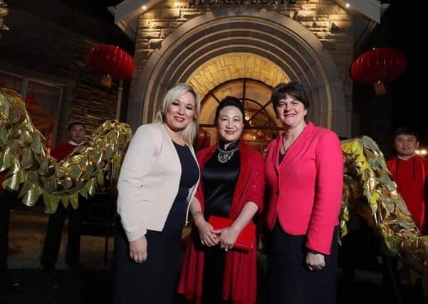 Arlene Foster and Michelle O’Neill pictured in January with  the Chinese Consul General in Belfast, Madame Zhang Meifang