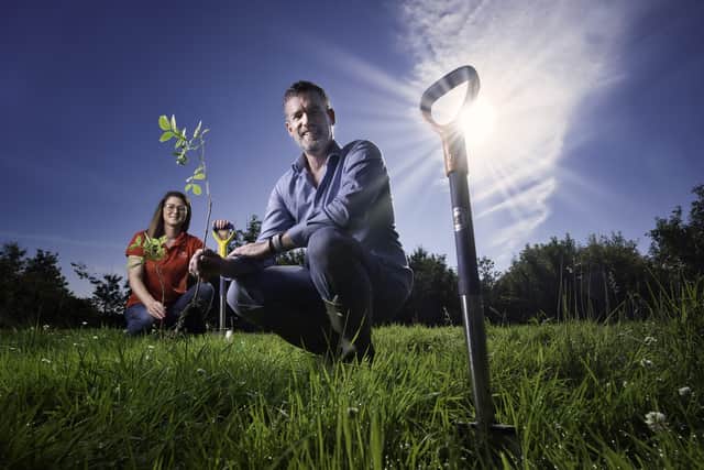 Lynsey Nixon, Communications, Engagement and Volunteers Manager at Woodland Trust NI pictured with Don Brennan, Trading Director at Hughes Insurance