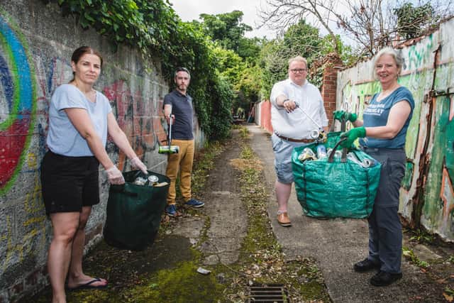 Cleaning up the alleyway at Rosetta are (L-R) Aoibhin Hutchinson, Gary McKeown, Seamas De Faoite and Pauline O'Hare