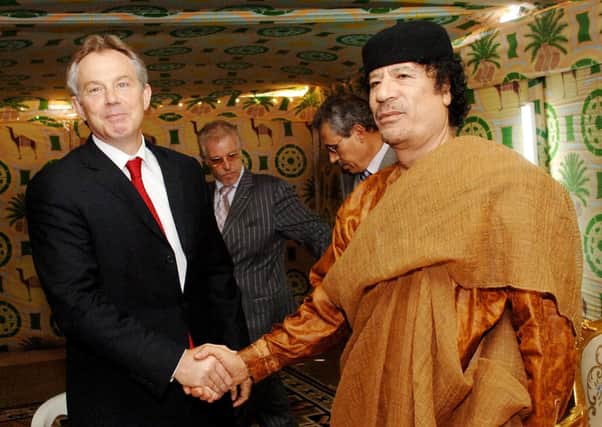 The then Prime Minister Tony Blair in May 2007 meeting Libyan leader Muammar Gaddafi at his desert base.  US, French, British and German victims of Libyan terrorism in 2005 sought redress from Libya. The said victims’ governments except Britain all backed their citizens claims. Photo: Stefan Rousseau/PA
