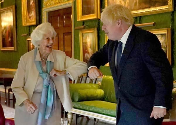13/08/2020: Prime Minister Boris Johnson meets the Point of Light winner, Maureen Lightbody at Hillsborough Castle