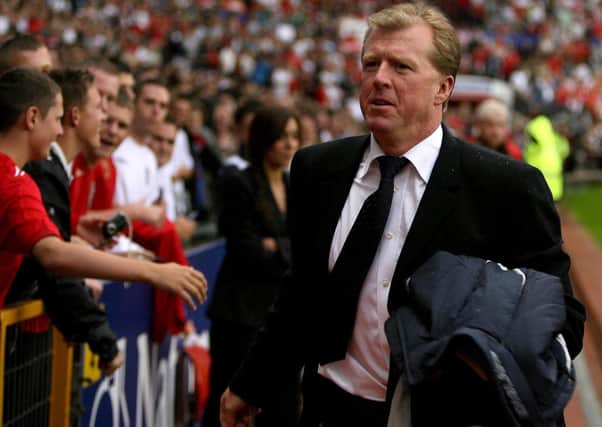 England's Steve McClaren walks down the touchline before the start of England's friendly international match at Old Trafford, Manchester, in 2006.