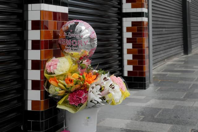 Flowers have been left in tribute to Andreea Maftei, Northern Ireland's latest Covid-19 victim