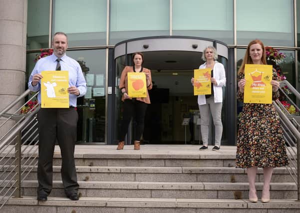 Simon Lee and Michelle Guy from Lisburn and Castlereagh City Council and Elaine Crory and Emma Wallace from Raise Your Voice launch a new campaign to help end sexual harassment against women