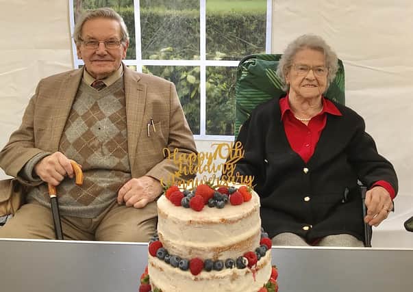 Ernie and Mollie Monteith from Omagh with their 70th wedding anniversary cake