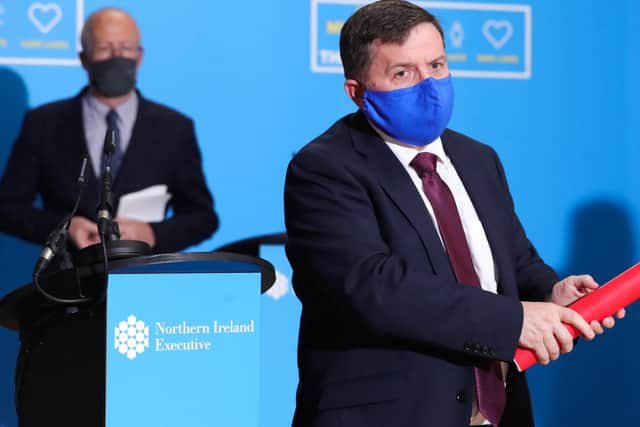 Health Minister Robin Swann and Chief Scientific Officer Professor Ian Young at a press conference