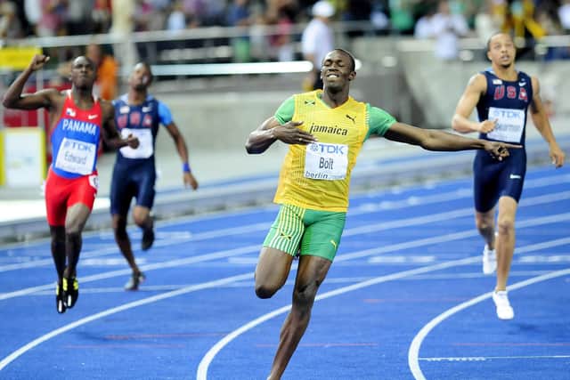 Jamaica's Usain Bolt sets a new World Record to win the Men's 200m Final during the IAAF World Championships at the Olympiastadion, Berlin.