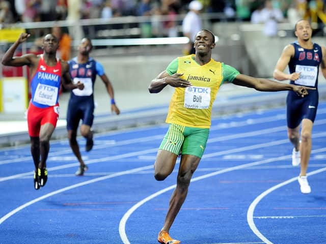 Jamaica's Usain Bolt sets a new World Record to win the Men's 200m Final during the IAAF World Championships at the Olympiastadion, Berlin.