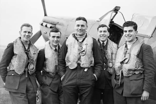 Some of RAF Squadron No. 41 at Hornchurch, Essex, 1940. (L to R) Flying Officer John MacKenzie, Flight-Lieutenant A D J Lovell, Squadron Leader Finlay, Flight-Lieutenant N Ryder and Pilot Officer R Ford