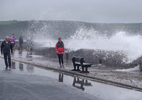 Waves crashing on the Front Strand in Youghal, Co. Cork on Wednesday evening as Storm Ellen began battering the Irish coastline. PA image