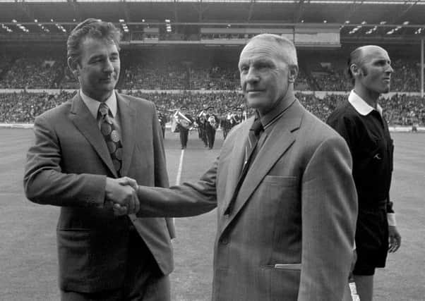 Leeds United manager Brian Clough (left) shakes hands with Liverpool manager Bill Shankly before the kick-off in 1974.